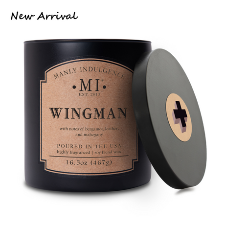 an image of the candle classic plus Wingman. The lid of the candle is placed against the candle on its side