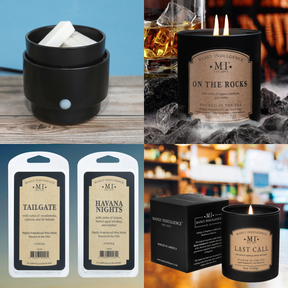 Collection of Manly Indulgence candles and packaging with branding and product names.